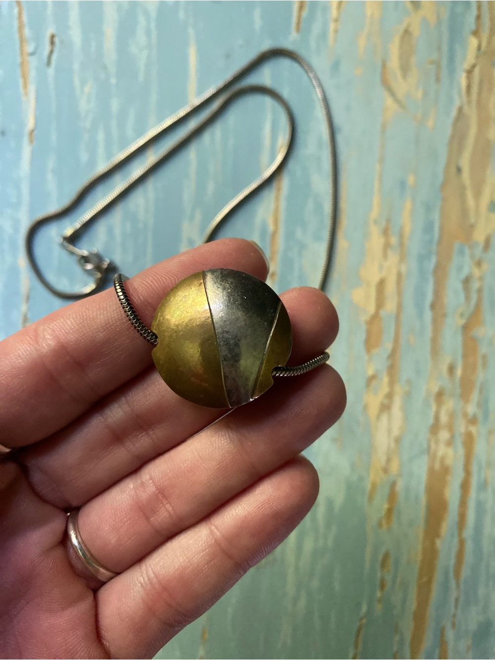 Two-Tone Round Pendant Necklace in Brass and Silver